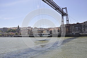 Bizkaiko Zubia or Vizkaya iron Bridge over Nervion river from Bilbao city in Basque Country of Spain photo