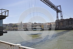 Bizkaiko Zubia or Vizkaya iron Bridge over Nervion river from Bilbao city in Basque Country of Spain photo