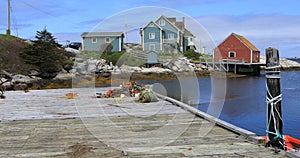 Scene of colorful buildings at Peggys Cove in Nova Scotia 4K