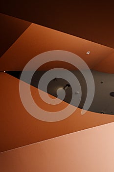 Low angle view of pink background interior of gallery