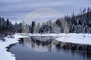 Scene in Glacier National Park outside Kalispell, Montana on a cloudy winter day