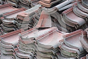 Scene of leftover red rooftiles on the ground