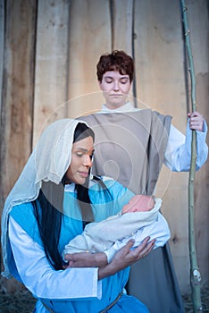 Scene of the nativity with transgender characters