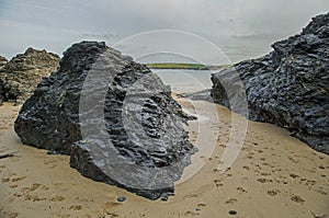 Cornish beach scene in November showing rocks and the sea