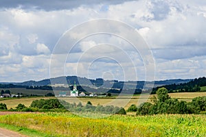 Scene of rural settlement and church in Siberia, Russia