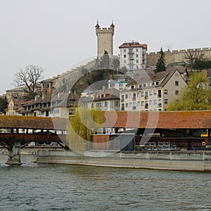 Scene st the shore of the Reuss, river leading trough Lucerne