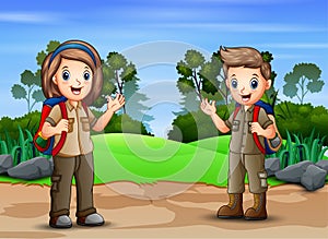 Scene with two scout hiking in nature landscape