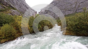 A scene of a very rainy day in the Briksdal Glacier Valley, Norway