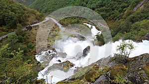 A scene of a very rainy day in the Briksdal Glacier Valley, Norway