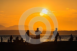 Scene view of silhouette people on the beach with sunset,on summer,Seattle,usa