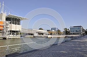 Scene with waterfront Oceanarium Modern building from Parque das Nacoes or Park of the Nations area in Lisbon