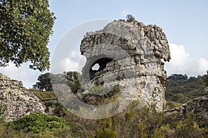 Scenery. Alcornocales Natural Park. View of the rock called La Montera del Torero, Los Barrios town, photo