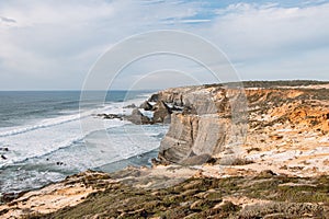 Scenery of the Atlantic coast contrasts the many colors of the Odemira region, western Portugal. Wandering along the Fisherman photo
