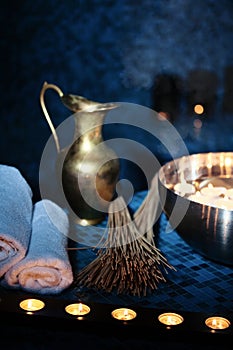 Scenery baths hammam, spa procedures. Copper jug, bowl with burn