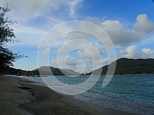 The scenery of beach with crystal blue water