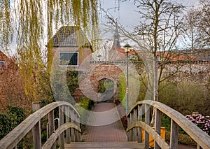 Scenery with a bridge and the historical city wall in the dutch town Hattem, Province Gelderland