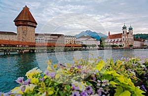 Scenery of Chapel Bridge Kapellbrucke over Reuss River in Lucern, Switzerland, with Water Towe