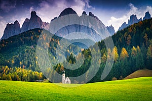 Scenery of Dolomites with the St. John's in Ranui Chapel, Santa Maddalena. Italy