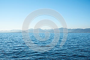 Scenery of Garda Lake with a view of mountains in the background, Italy