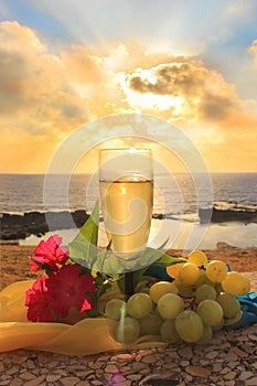 Scenery with glass of white wine