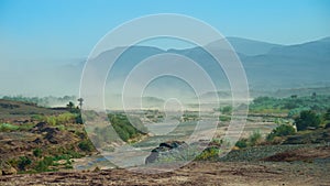 Scenery at High Atlas Mountains with river in Morocco