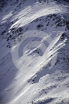 Scenery of high mountains wiht snow and cloud atmosphere