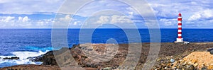 Scenery with light house on the rocks. Punta Sardina ,Grand Canary island photo