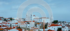Scenery of Lisbon. Panoramaview of Alfama old town district on cloudy day, Lissabon, Portugal. Red-white colored