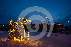 Scenery of a luminous dragon in Kazan against the backdrop of the railway station