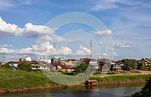 Scenery of many residential houses erected along the banks