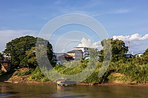 Scenery of many residential houses erected along the banks