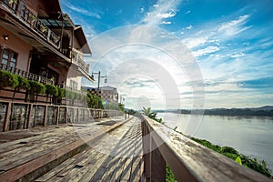 The scenery of the  Mekong River and walkway with lens flair in Chiang Khan