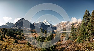 Scenery of Mount Assiniboine with Lake Magog in autumn forest at provincial park