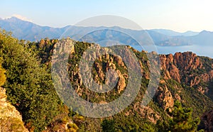 scenery of the red rocks called  Badlands or Calanches in Corsica in France without people