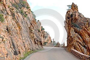 scenery of the red rocks called  Badlands or Calanches in Corsica in France without people