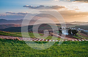 The scenery of red soil under the sunset