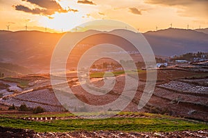 The scenery of red soil under the sunset