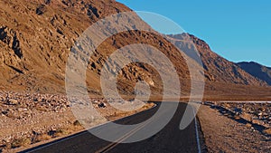 Scenery road through the amazing landscape of Death Valley National Park California