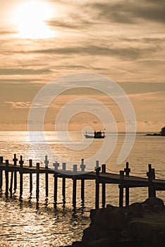 The scenery of the silhouette of the wood bridge in sunset time in Koh Kood island, Trat province, Thailand