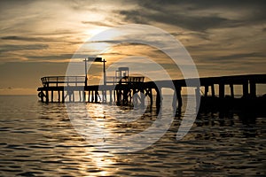 The scenery of the silhouette of the wood bridge in sunset time in Koh Kood island, Trat province, Thailand