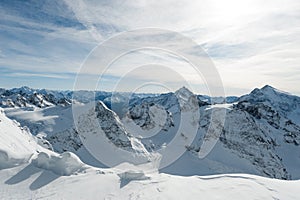 Scenery of snow covered mountains valley Titlis, Engelberg