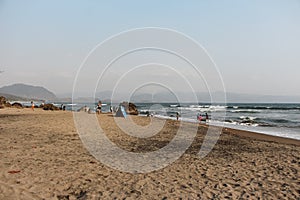 Scenery of a stretch of brownish sand on a beach in the Sukabumi area