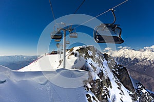 Scenery top view on winter mountains from ski resort Gorky Gorod