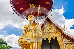 Scenery view golden Buddhist monk statue in Buddha Thailand Temple