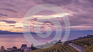 Scenery view of vineyards over Leman lake (Geneva Lake) with sky and clouds. Famous Lavaux region, Vaud Canton