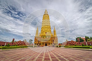 The scenery of the Wat Bang Thong temple golden pagoda at Krabi province, Thailand