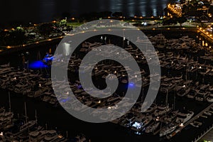 Scenic aerial panoramic long exposure view of the San Diego bay and marina at night, California