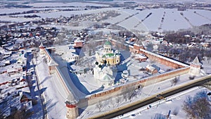 Scenic aerial view of architectural complex of medieval fortified Zaraysk Kremlin on sunny winter day, Russia