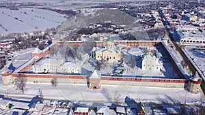 Scenic aerial view of architectural complex of medieval fortified Zaraysk Kremlin on sunny winter day, Russia