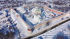 Scenic aerial view of architectural complex of medieval fortified Zaraysk Kremlin on sunny winter day, Russia